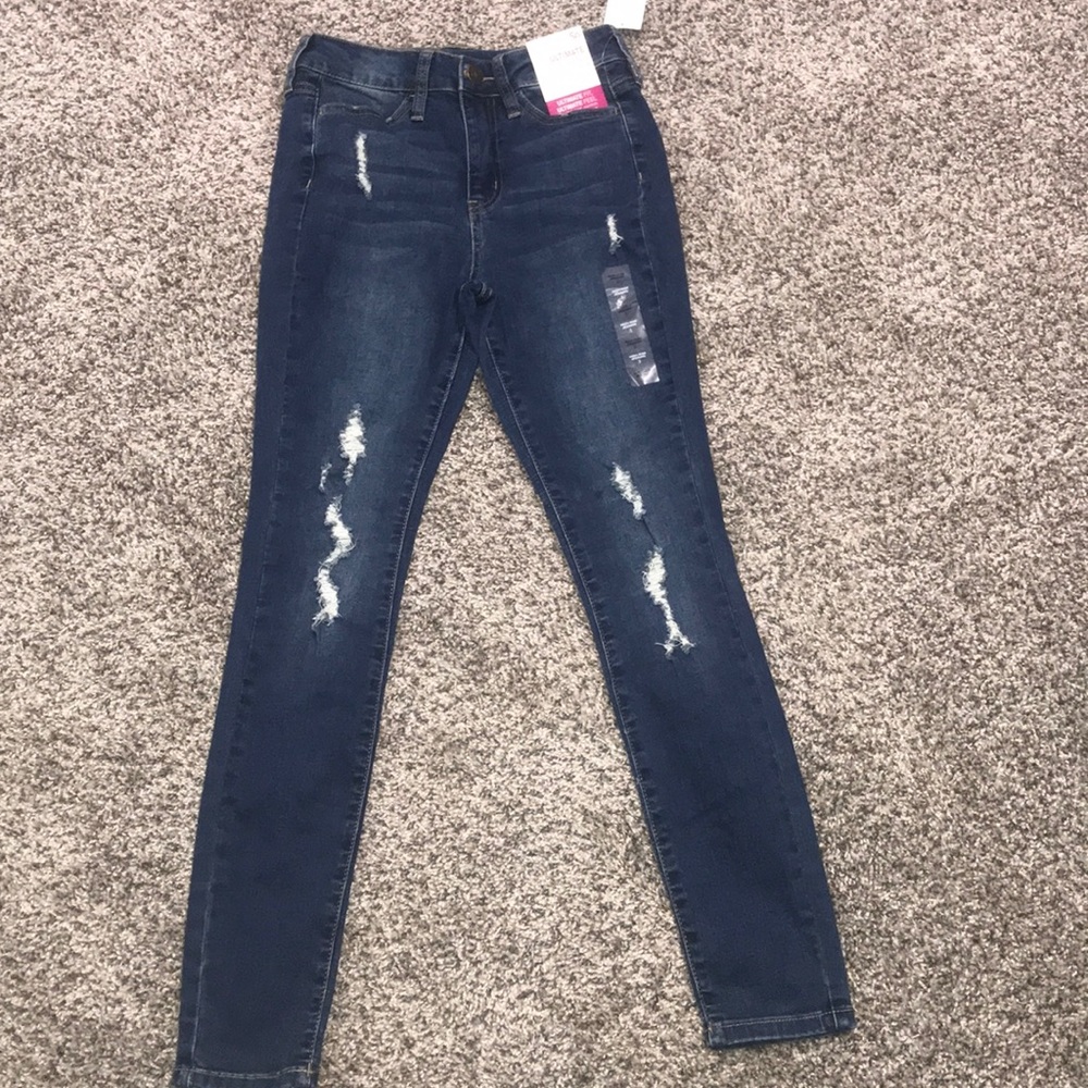 Medium wash distressed skinny jeans
